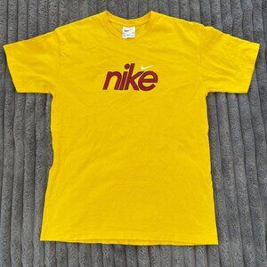 Vintage Nike Yellow Short Sleeve T-Shirt With Red Logo Graphic Made in the USA